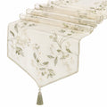 Chemin de table en organza avec motif floral brodé vert