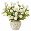 Arrangement floral artificiel avec fleurs blanches et pot texturé
